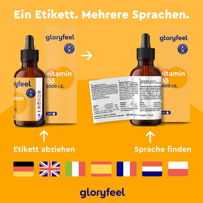 Das Bild zeigt zwei Flaschen Vitamin D3 Tropfen 5000 I.E. der gloryfeel GmbH. Die linke Flasche zeigt das Etikett, die rechte eine teilweise aufgeklappte Gebrauchsanweisung. Mehrere Flaggen stehen für die verfügbaren Sprachen.