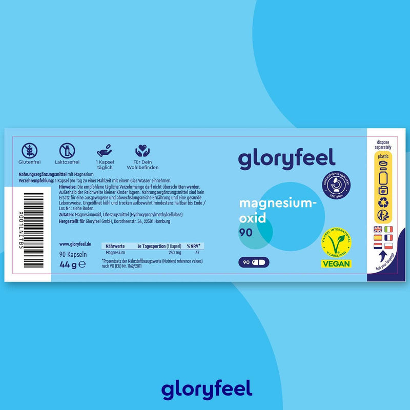Eine blaue Schachtel Magnesiumoxid 90 Kapseln der gloryfeel GmbH. Vegan, gluten- und laktosefrei mit hervorgehobenen Nährwertangaben und Zertifizierungen auf dem Etikett.