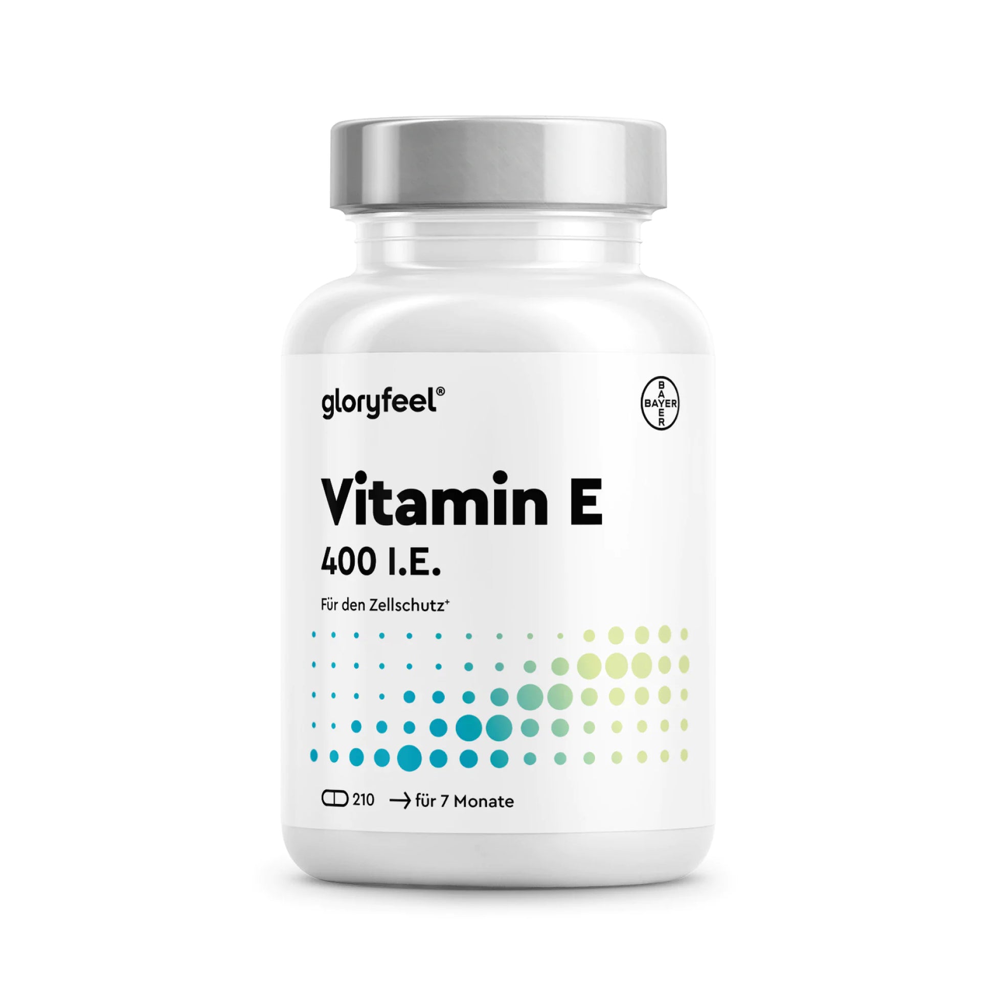 Eine weiße Flasche mit der Aufschrift „gloryfeel Vitamin E Kapseln“, einem grauen Verschluss, einem blaugrünen Punktmuster und einem deutschen Text, der angibt, dass 210 Kapseln für 7 Monate reichen.